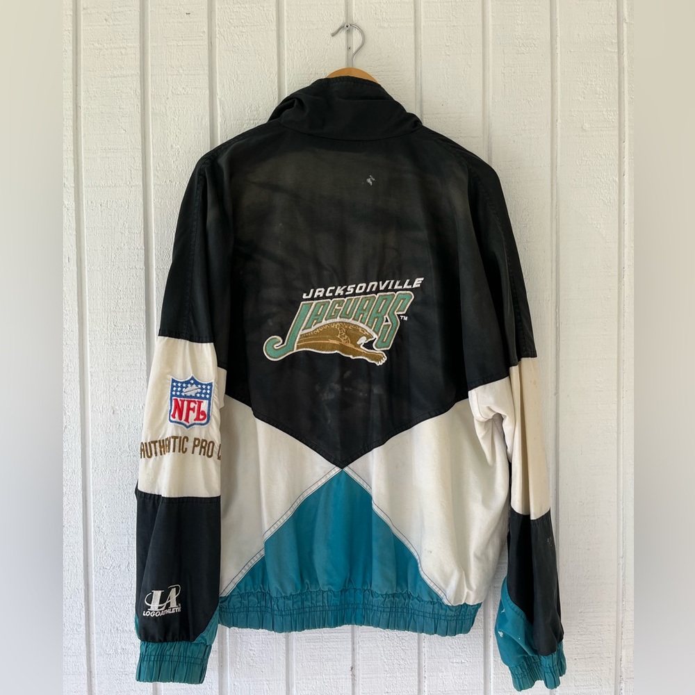 Thrashed Vintage Logo Athletic Jacksonville Jaguars Windbreaker